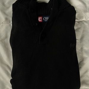 Black champs quarter button up sweater in good condition barley worn.
